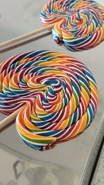 MatokLi’s handmade rainbow swirl lollipops